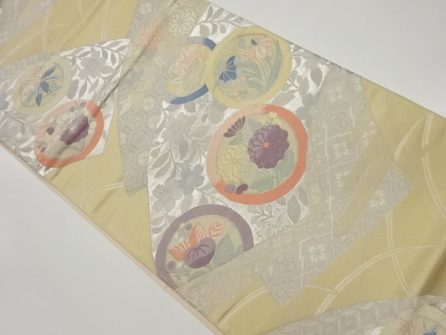 地紙に枝垂れ桜・花々模様織出し袋帯